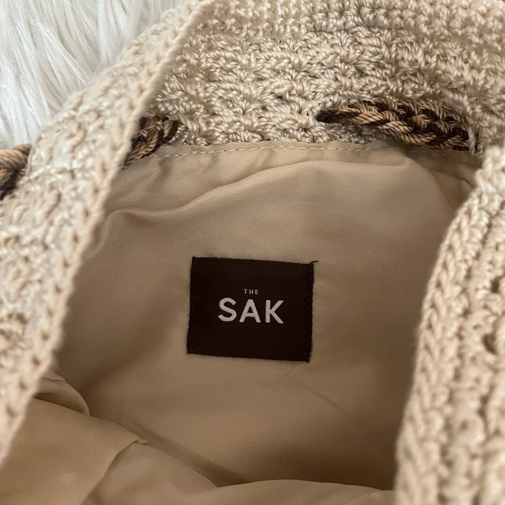 {The SAK} Crochet Drawstring Backpack Purse in Ivory